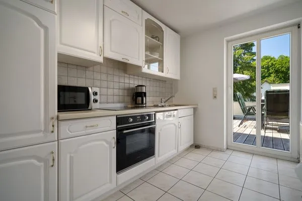 Apartment Strandglück Malchow - Küche mit Terrassen Zugang  Strandglück