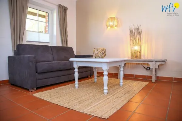 Wohnzimmer Ferienhaus am Gutspark Dranske Ferienwohnung Silbergras