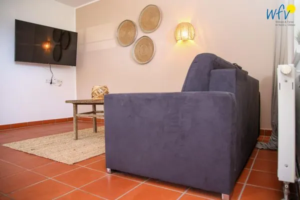 Wohnzimmer Ferienhaus am Gutspark Dranske Ferienwohnung Strandroggen