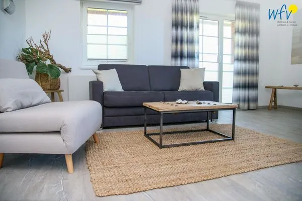 Wohnzimmer Ferienhaus am Gutspark Dranske Ferienwohnung Sonnentag