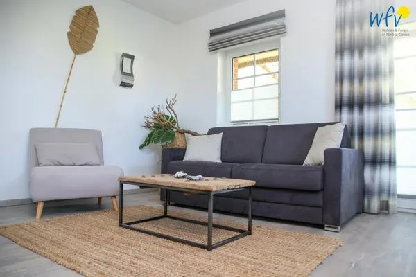 Wohnzimmer Ferienhaus am Gutspark Dranske Ferienwohnung Sonnentag