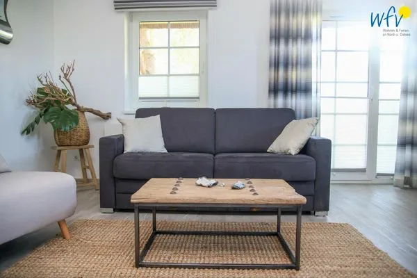 Wohnzimmer Ferienhaus am Gutspark Dranske Ferienwohnung Sonnentag