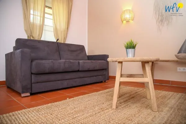 Wohnzimmer Ferienhaus am Gutspark Dranske Ferienwohnung Sonnenmeer