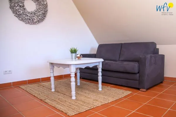 Wohnzimmer Ferienhaus am Gutspark Dranske Ferienwohnung Sonnenrose