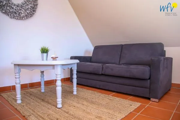 Wohnzimmer Ferienhaus am Gutspark Dranske Ferienwohnung Sonnenrose