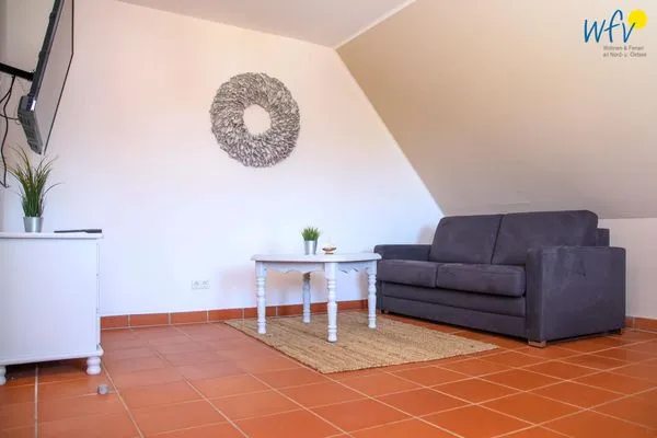 Wohnzimmer Ferienhaus am Gutspark Dranske Ferienwohnung Sonnenrose