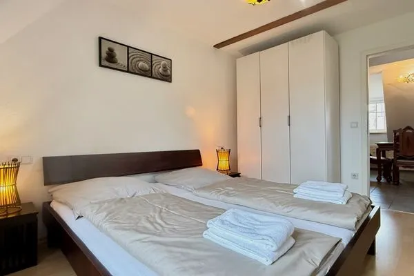  Ferienwohnung Doberauer Lindau Insel - Schlafzimmer - Doppelbett
