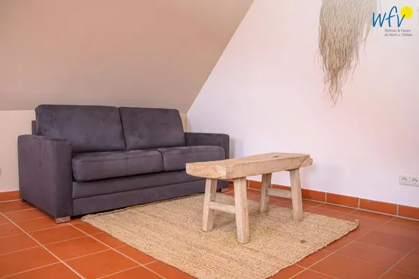 Wohnzimmer Ferienhaus am Gutspark Dranske Ferienwohnung Sonnenmorgen