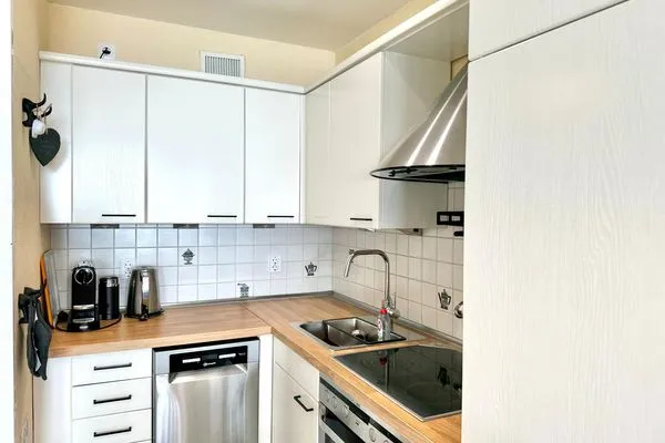 Entdecken Sie diese stilvolle Küche, perfekt zum Kochen und Wohlfühlen. Panoramic Sierksdorf Bayview