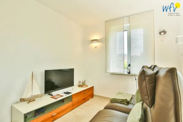 Wohnzimmer Haus Dünenblick Ferienwohnung 6