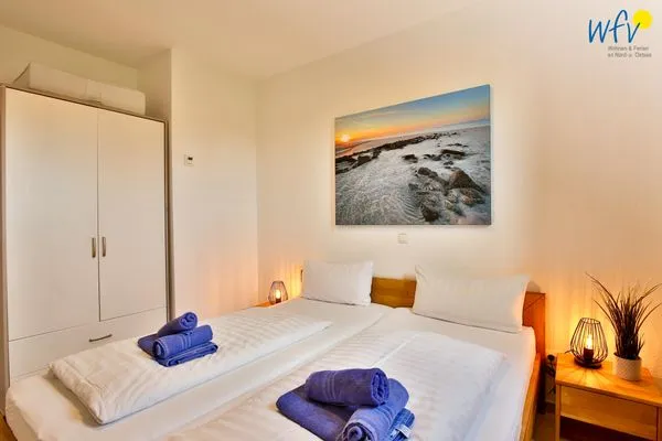 Schlafzimmer Haus Dünenblick Ferienwohnung 6