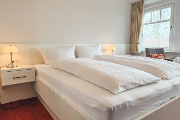  Gästehaus Röll - Studio 5  - Schlafzimmer