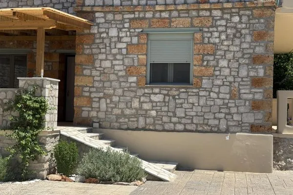 Facade / entrance  Nanita Stone House
