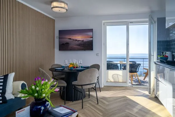 Wohnzimmer  FeWo Meerzeit - Balkon, Sauna, Meerblick