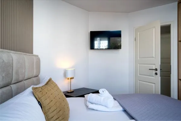 Schlafzimmer  FeWo Meerzeit - Balkon, Sauna, Meerblick