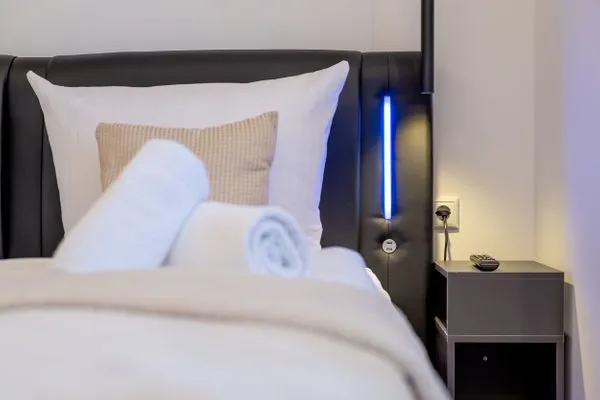 Schlafzimmer  FeWo Silbermöwe - Meerblick,Terrasse, Sauna, Fitness