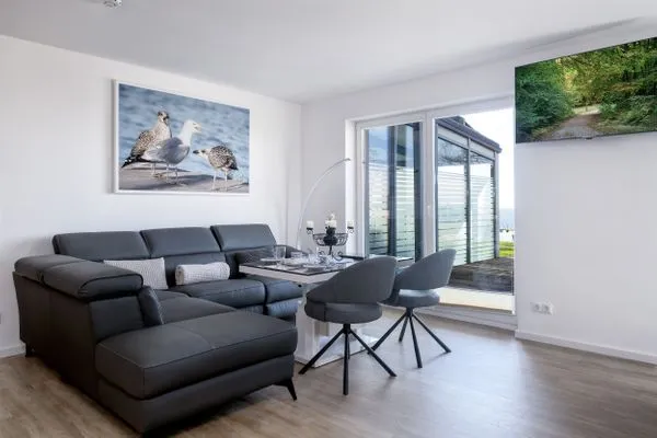 Wohnzimmer  FeWo Silbermöwe - Meerblick,Terrasse, Sauna, Fitness