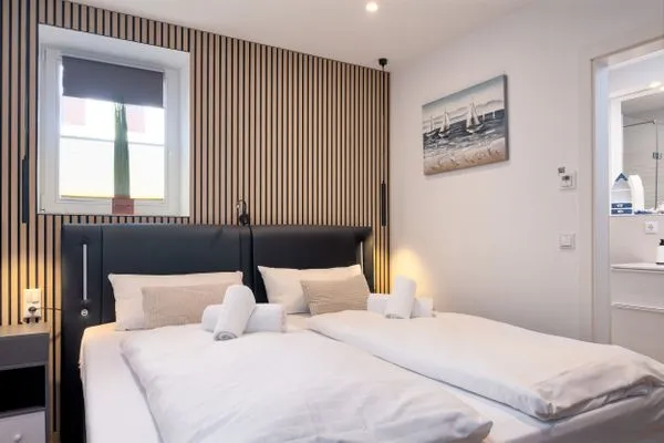 Schlafzimmer  FeWo Silbermöwe - Meerblick,Terrasse, Sauna, Fitness