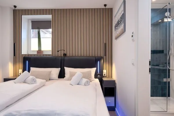 Schlafzimmer  FeWo Silbermöwe - Meerblick,Terrasse, Sauna, Fitness