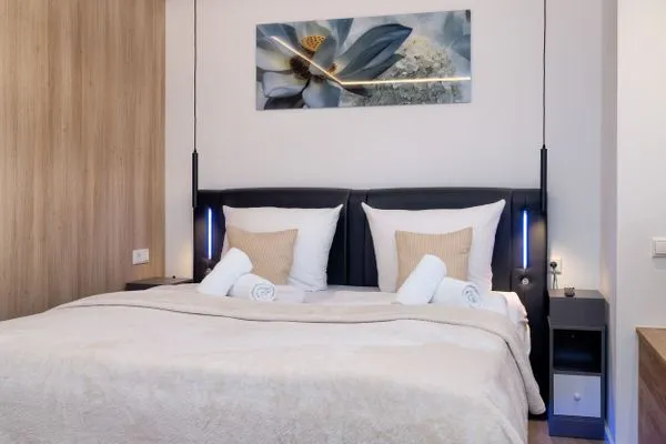 Schlafzimmer  FeWo Silbermöwe - Meerblick,Terrasse, Sauna, Fitness