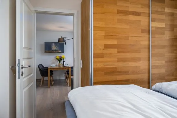 Schlafzimmer  FeWo Hafenliebe - Kamin, Sauna, Meerblick