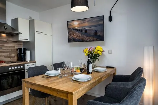 Wohnzimmer  FeWo Hafenliebe - Kamin, Sauna, Meerblick