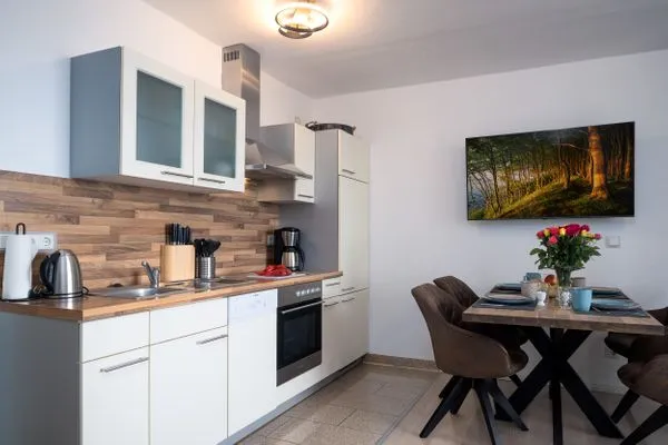 Küche / Küchenzeile  FeWo Sonnenschein -  Kamin, Sauna, Meerblick