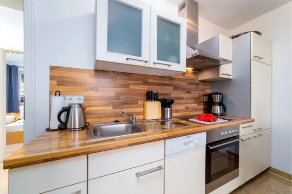 Küche / Küchenzeile  FeWo Sonnenschein -  Kamin, Sauna, Meerblick