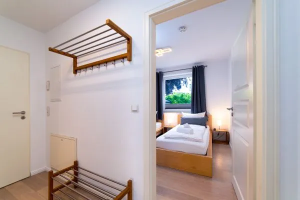 Schlafzimmer  FeWo Sonnenschein -  Kamin, Sauna, Meerblick