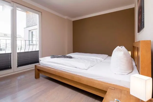 Schlafzimmer  FeWo Fontane - Kamin, Sauna, Meerblick, Badeteich