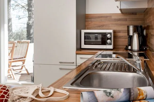 Küche / Küchenzeile  FeWo Haubentaucher - Kamin, Sauna, Meerblick