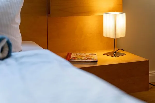 Schlafzimmer  FeWo Strandfrieden - Kamin, Sauna, Meerblick