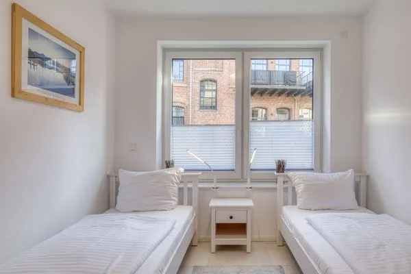 Ferienwohnung Pusteblume in Malchow Schlafzimmer mit zwei Einzelbetten  Pusteblume