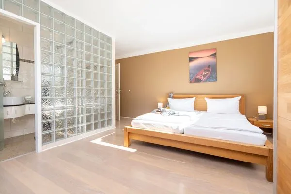 Schlafzimmer  FeWo Südwarts - Kamin, Sauna, Meerblick