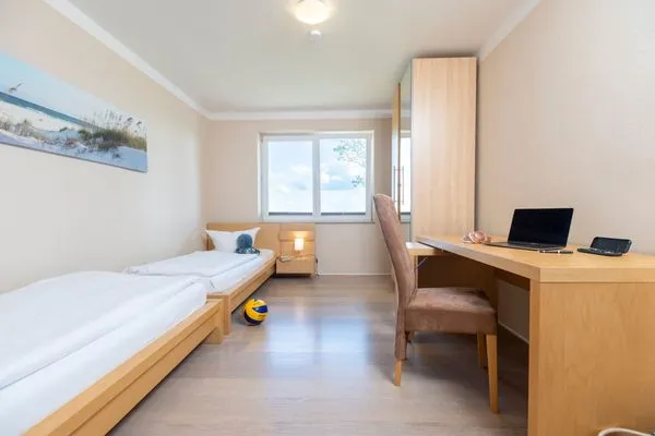 Schlafzimmer  FeWo Südwarts - Kamin, Sauna, Meerblick