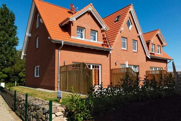 Hauptansicht Reihenhäuser Timmendorf Strand Haus Sonnenaufgang