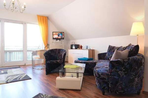 Living room Ferienwohnungen Am Lotsenstieg Abendrot