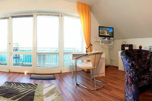 Living room Ferienwohnungen Am Lotsenstieg Abendrot