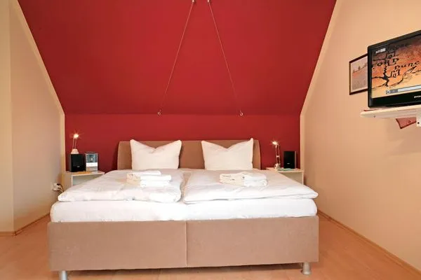 Bedroom Ferienwohnungen Am Lotsenstieg Morgensonne