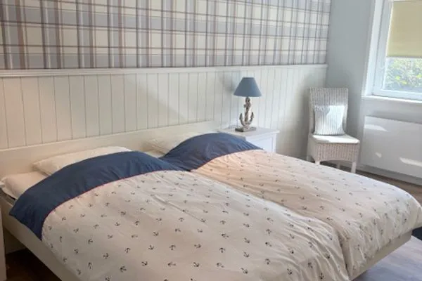 Schlafzimmer Ferienhaus Greune-Stee-Weg 39 Ferienwohnung Südstrandflair