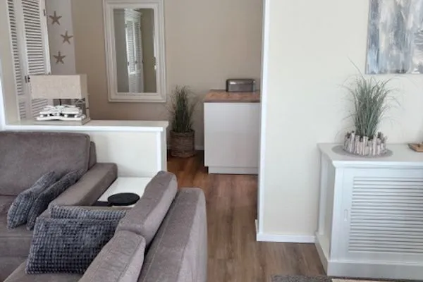 Wohnzimmer Ferienhaus Greune-Stee-Weg 39 Ferienwohnung Südstrandflair