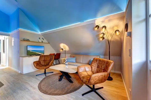 Wohnzimmer  Dünenhäuser Ückeritz UnserUsedomDe FeWo ca.80qm mit privater Sauna und Kamin, Parkplatz, direkt am Strand. 7/3