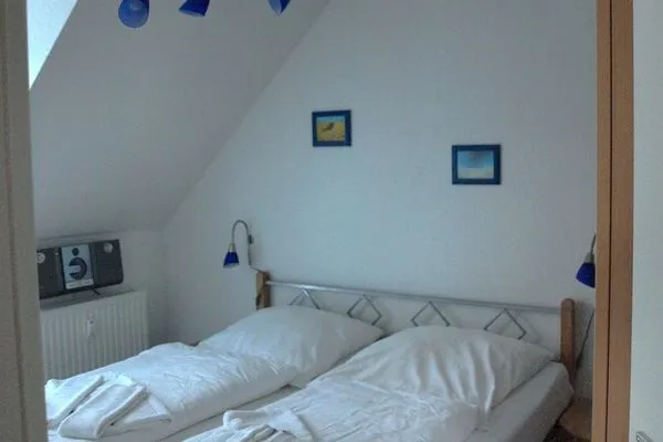 Schlafzimmer  Ferienwohnung Meeresleuchten