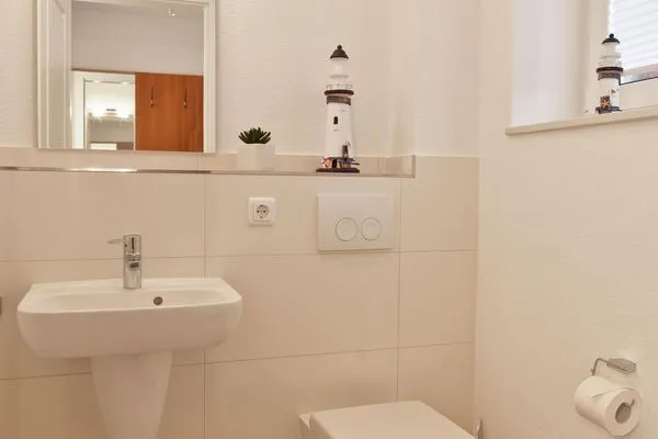 Bathroom Haus Südwester Knurrhahn