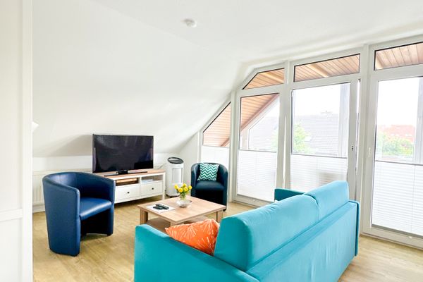  Ferienwohnung Pamirhuus Norderney - Wohnzimmer