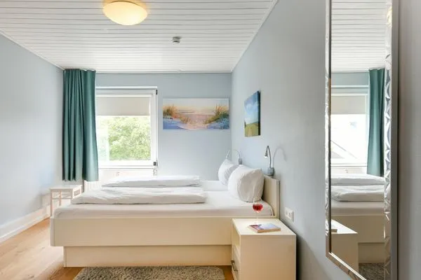 Schlafzimmer Haus Südwind Ferienwohnung 18