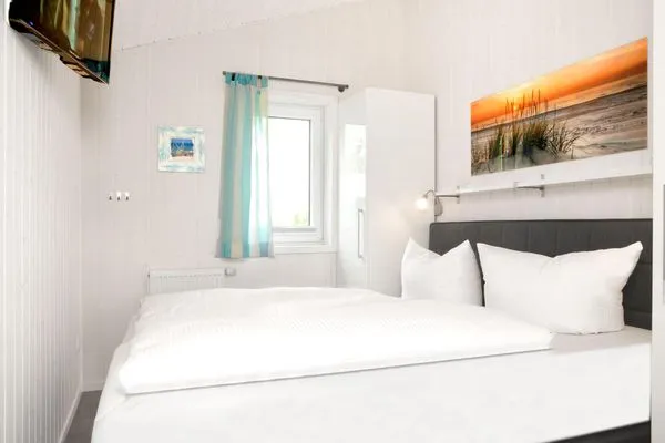 Bedroom Dänisches Ferienhaus am Salzhaff, Haus Strandbrise