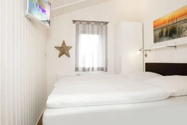 Bedroom Dänisches Ferienhaus am Salzhaff, Haus Strandhafer