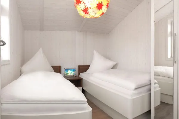 Bedroom Dänisches Ferienhaus am Salzhaff, Haus Vogelparadies