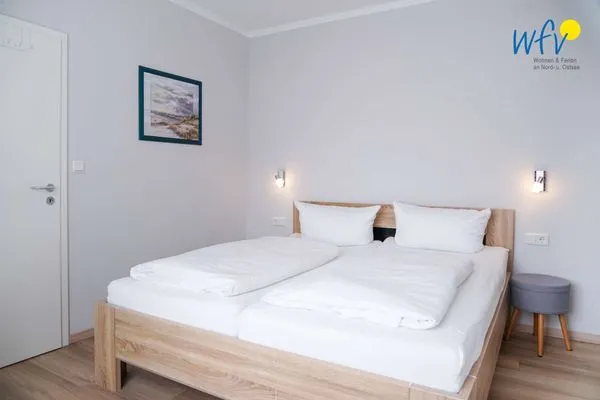 Schlafzimmer Apartmenthaus Roberta Ferienwohnung Seehund